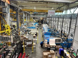 The factory floor at Baytech Plastics, showing several machines.