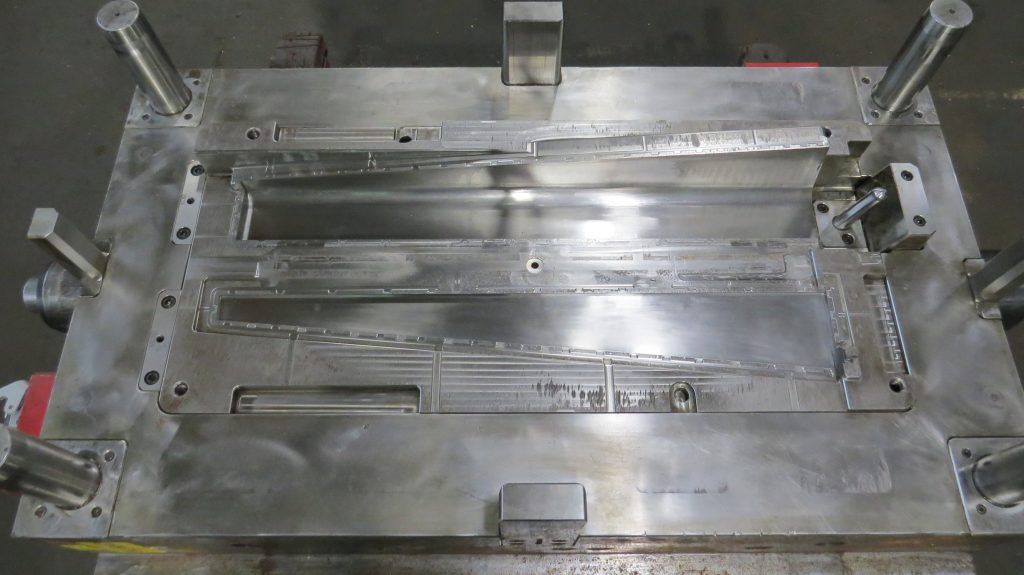 Interior of plastic injection molding tool showing mold quality and precision tooling design